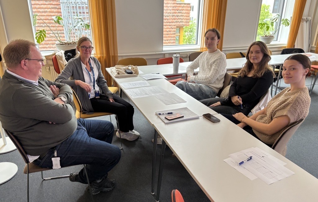 People round a table