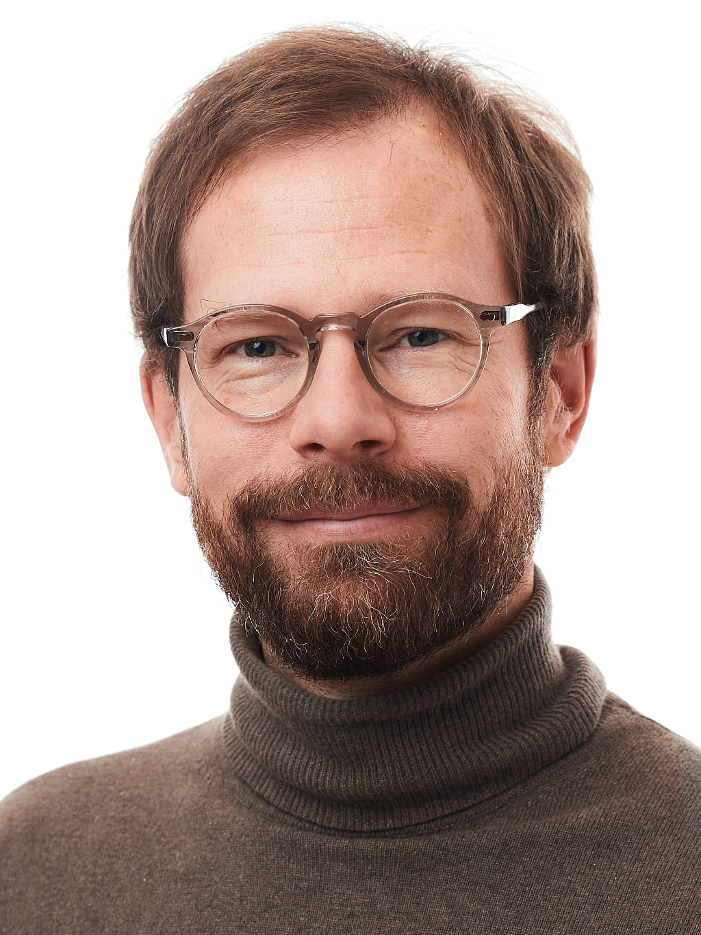 Smiling man in blue sweater