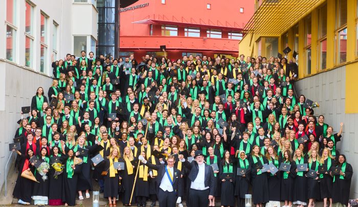 Image of graduated students in academic gown